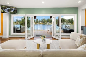 Here is the amazing water view from the living room with a huge outdoor deck!