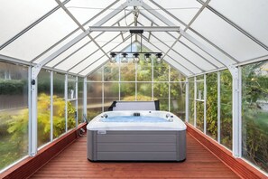 Here is the outdoor hot tub room in the backyard
