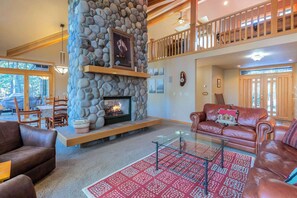 Leather couches and a large coffee table for the family to gather around.