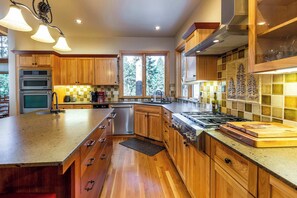 Large fully stocked kitchen.
