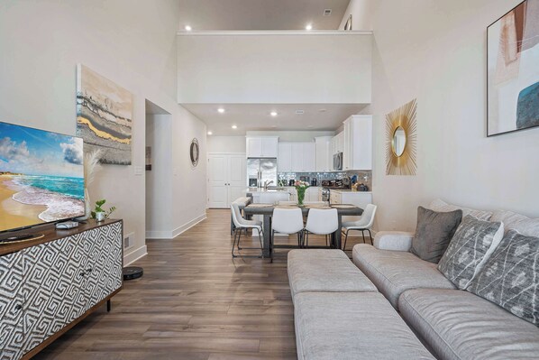 Curl up in the chic living room & stream your favorites on the smart TV