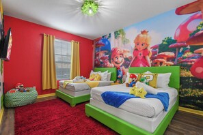 Super Mario-themed room with two full beds—perfect for fun and adventure