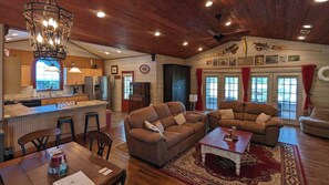 Living room with Kitchen to left
