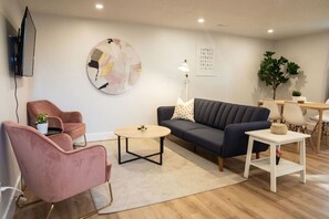 As you take a seat in the living room, the comfortable furniture and tasteful design make it easy to unwind.