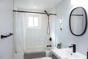 The bathroom is a private sanctuary, with a layout and features that make it the perfect place to rejuvenate.