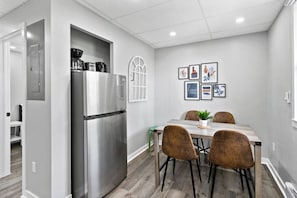 You are surrounded by tasteful decor and warm tones, making the dining room a perfect setting for any occasion.