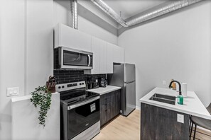 You can almost hear the sizzle of ingredients as you cook in the well-equipped kitchen, where every detail is designed for convenience.