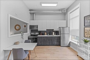 As you step into the kitchen, the clean lines and functional design make you eager to start cooking your favorite dishes.