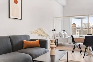 As you take a seat in the living room, the comfortable furniture and tasteful design make it easy to unwind.