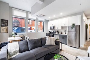 As you take a seat in the living room, the comfortable furniture and tasteful design make it easy to unwind.