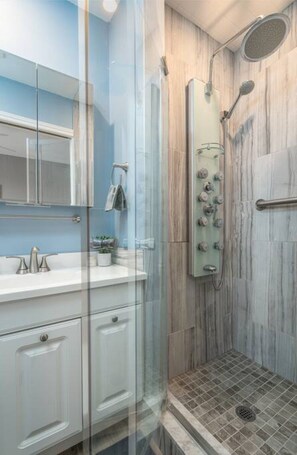 The bathroom is a private sanctuary, with a layout and features that make it the perfect place to rejuvenate.