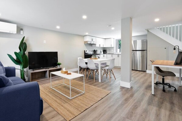 As you take a seat in the living room, the comfortable furniture and tasteful design make it easy to unwind.