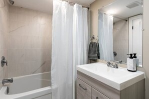 The bathroom is a private sanctuary, with a layout and features that make it the perfect place to rejuvenate.