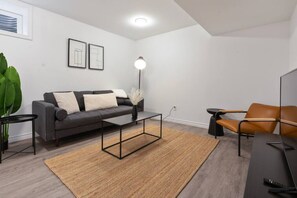 As you take a seat in the living room, the comfortable furniture and tasteful design make it easy to unwind.