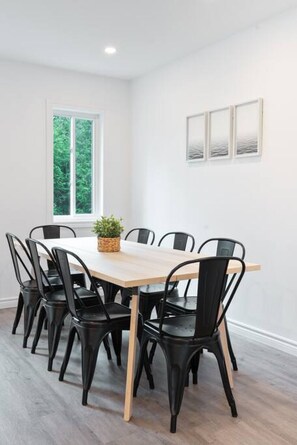 You are surrounded by tasteful decor and warm tones, making the dining room a perfect setting for any occasion.