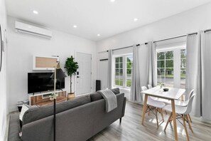Relax in the living room and watch your favorite shows, lounging is a great way to unwind after a long day.