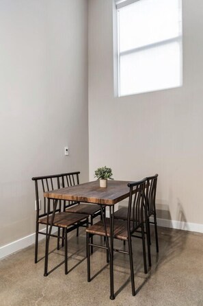 The dining area invites you to savor every moment, whether enjoying a quiet meal or hosting a festive gathering.