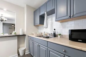 As you step into the kitchen, the clean lines and functional design make you eager to start cooking your favorite dishes.