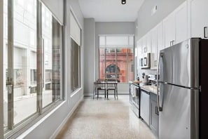 As you step into the kitchen, the clean lines and functional design make you eager to start cooking your favorite dishes.