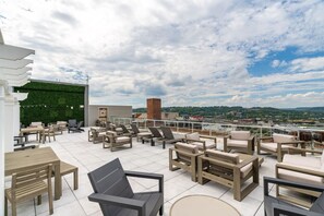 The outdoor areas’ plush seating beckons you to sink in and relax, surrounded by light and airy decor.