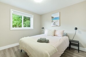 You feel a sense of peace as you step the bedroom with its inviting decor and soothing tones.elax