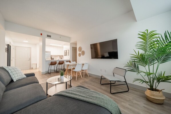 Relax in the living room and watch your favorite shows, lounging is a great way to unwind after a long day.