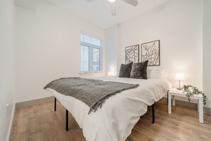 As you enter the bedroom, the sophisticated decor and plush bedding create a space where you can truly unwind.