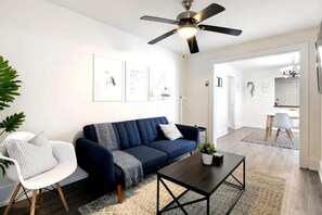 As you take a seat in the living room, the comfortable furniture and tasteful design make it easy to unwind.