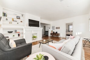 Comfy, light-filled space with 55" smart TV, Bluetooth stereo, books & games!