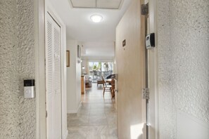 Enter the property through the front door
