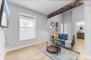 Relax in the living room and watch your favorite shows, lounging is a great way to unwind after a long day.