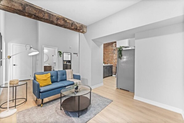 As you take a seat in the living room, the comfortable furniture and tasteful design make it easy to unwind.