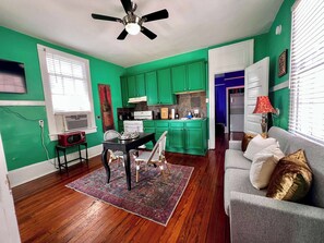 seating for the dining room table, cozy sofa and TV 