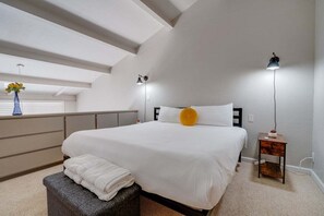 Cozy bedroom in the open loft.