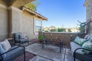 Back patio with view of the lake and sunset.