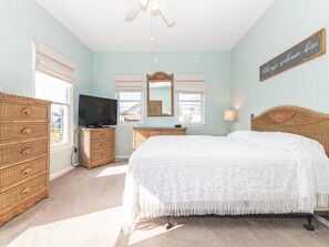 Master bedroom showcasing its tranquil ambiance and access to modern amenities.