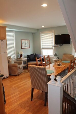 Open-concept layout connecting the kitchen and living area, perfect for entertaining.