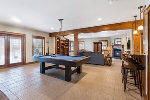 Lower Level Living Room with Pool Table and Full Second Kitchen