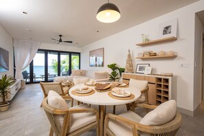 Sleek, contemporary furnishings complement stunning panoramic sea views