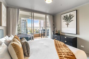 King bed with a harbour view