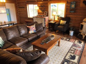 Main level living room access to deck, hot tub, king master, kitchen&dining room
