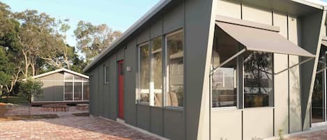 Sunroom and parking area.