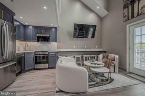 Large TV and seating area for entertainment 