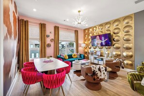 Discover Nashville's vibrant spirit in this stylish vacation rental for large groups. With a lively dining area, plush seating, and city views, it's perfect for bachelorette parties or family reunions—offering luxury and entertainment just steps from Music City.