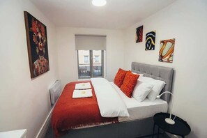 Relax and recharge in this stylishly designed bedroom