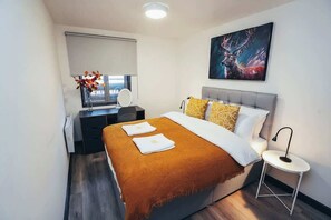 Relax and recharge in this stylishly designed bedroom