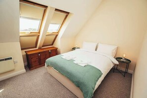 Recharge at night and stay productive by day with this versatile bedroom setup