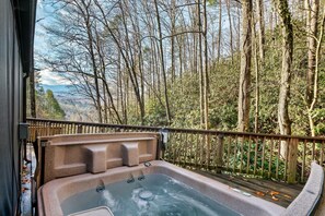 Step into luxury and enjoy a soothing soak in the hot tub.