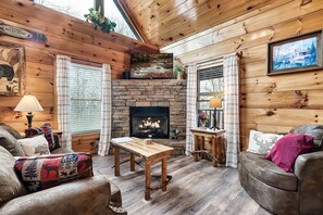 Relax and unwind in this cozy, inviting living room—perfect for family time or a peaceful retreat