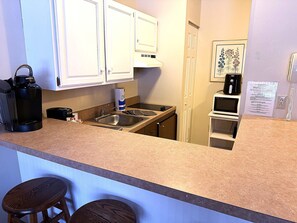 kitchen complete w air fryer, microwave stovetop dishwasher and stocked keurig